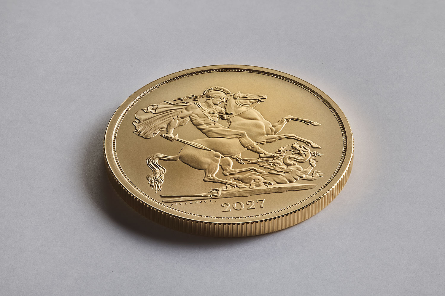 a27-the-five-sovereign-piece-2027-brilliant-uncirculated-coin-angled-flat-with-shadow.jpg